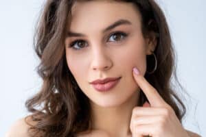 Woman with youthful skin after facial treatment in Denver, CO